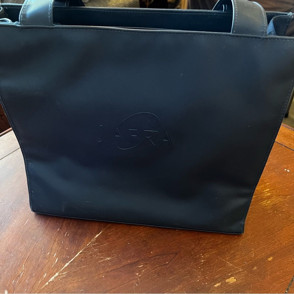 Jafra blue vinyl tote with zipper and inside pocket. Strong and sturdy.